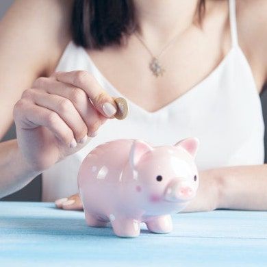 Customer getting money back in a piggy bank